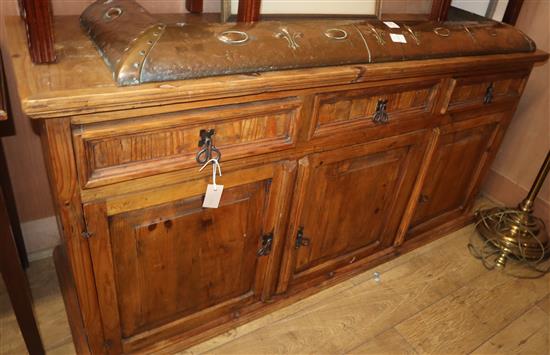 An olive wood dresser, fitted three drawers over panelled cupboards, W.168cm